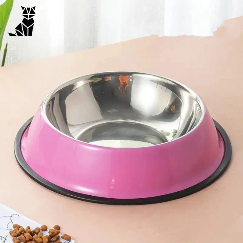 Gamelle personnalisée pour chat en acier inoxydable durable - bol rose avec bord noir sur table