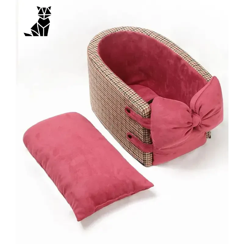 Le siège auto Ultimate Comfort pour chiens est doté d’un lit douillet avec un nœud rose - parfait pour les animaux de compagnie